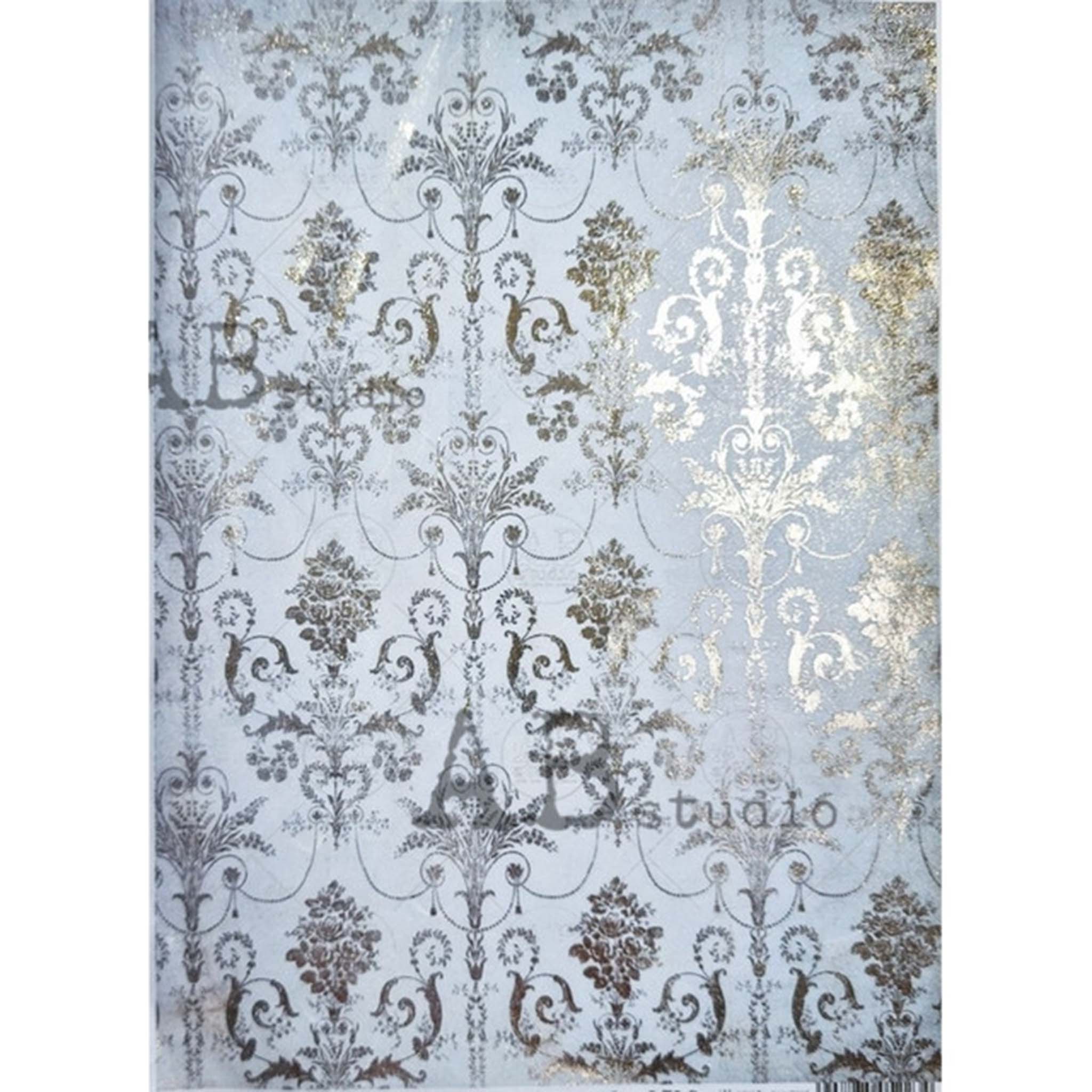 A4 rice paper that features a silver gilded baroque pattern against a light blue background. White borders are on the sides.