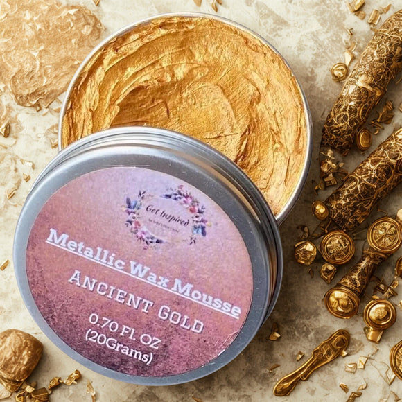 A 0.70 (20 ml) open container of Dadarkar Art's Ancient Gold Metallic Wax Mousse is shown with chunky gold wax drippings.
