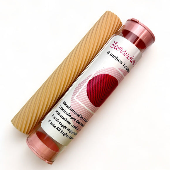 A texture roller and packaging tube of Dadarkar Art's Seersucker Stripes are against a white background.