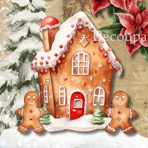 Close-up of half of a rice paper design that features a snowy gingerbread house scene with gingerbread people.