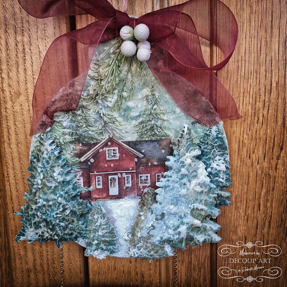 A small round hanging ornament craft features colorful castings created from Decoupage Queen's Winter Trees silicone mold.
