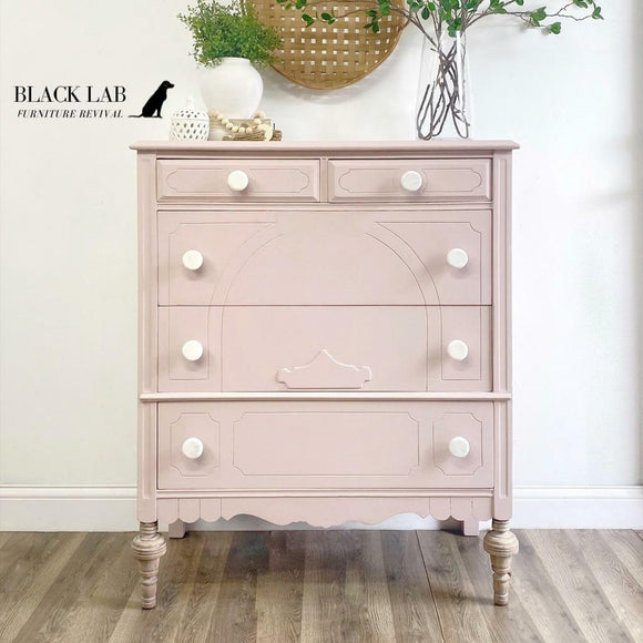 A vintage lingerie chest dresser refurbished by Black Lab Furniture Revival features Dixie Belle's Conch Silk All-In-One Mineral Paint.