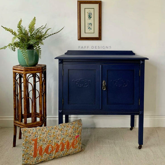 A vintage small bar cabinet refurbished by Faff Designs features Dixie Belle's Nautical Silk All-In-One Mineral Paint.