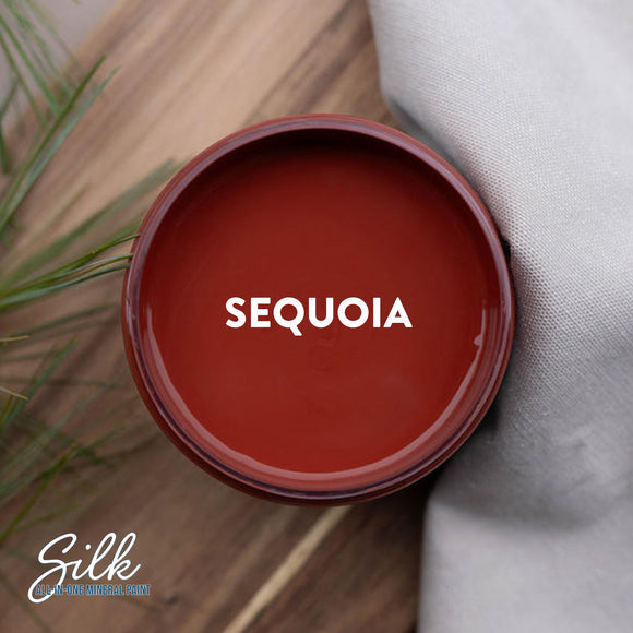 An arial view of an open container of Dixie Belle Paint Company's Sequoia Silk All-In-One Mineral Paint is shown with white text reading Sequoia.