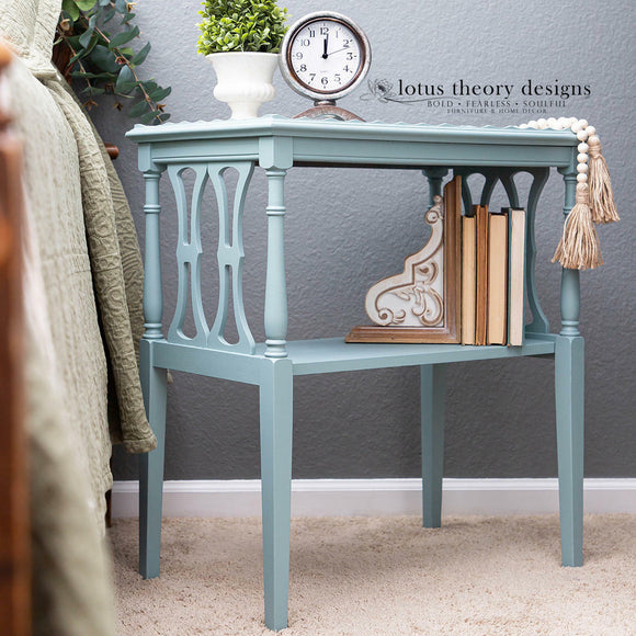 A vintage side table refurbished by Lotus Theory Designs features Dixie Belle's Serenity Silk All-In-One Mineral Paint.