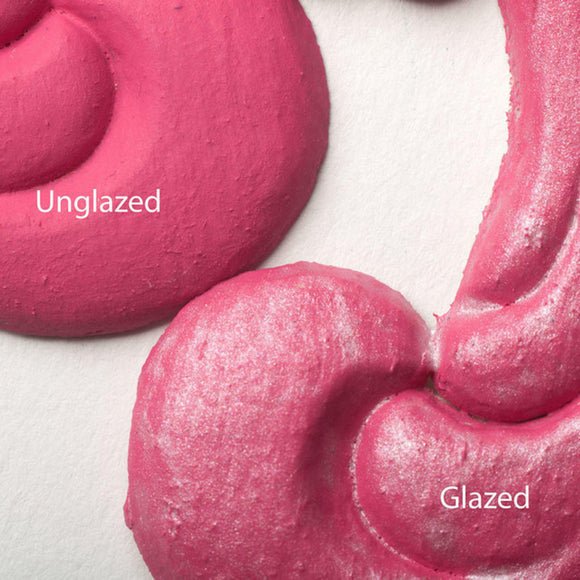 Close-up view of a pink colored silicone mould casting that shows the before and after use of Dixie Belle's Pearlescent Glaze.