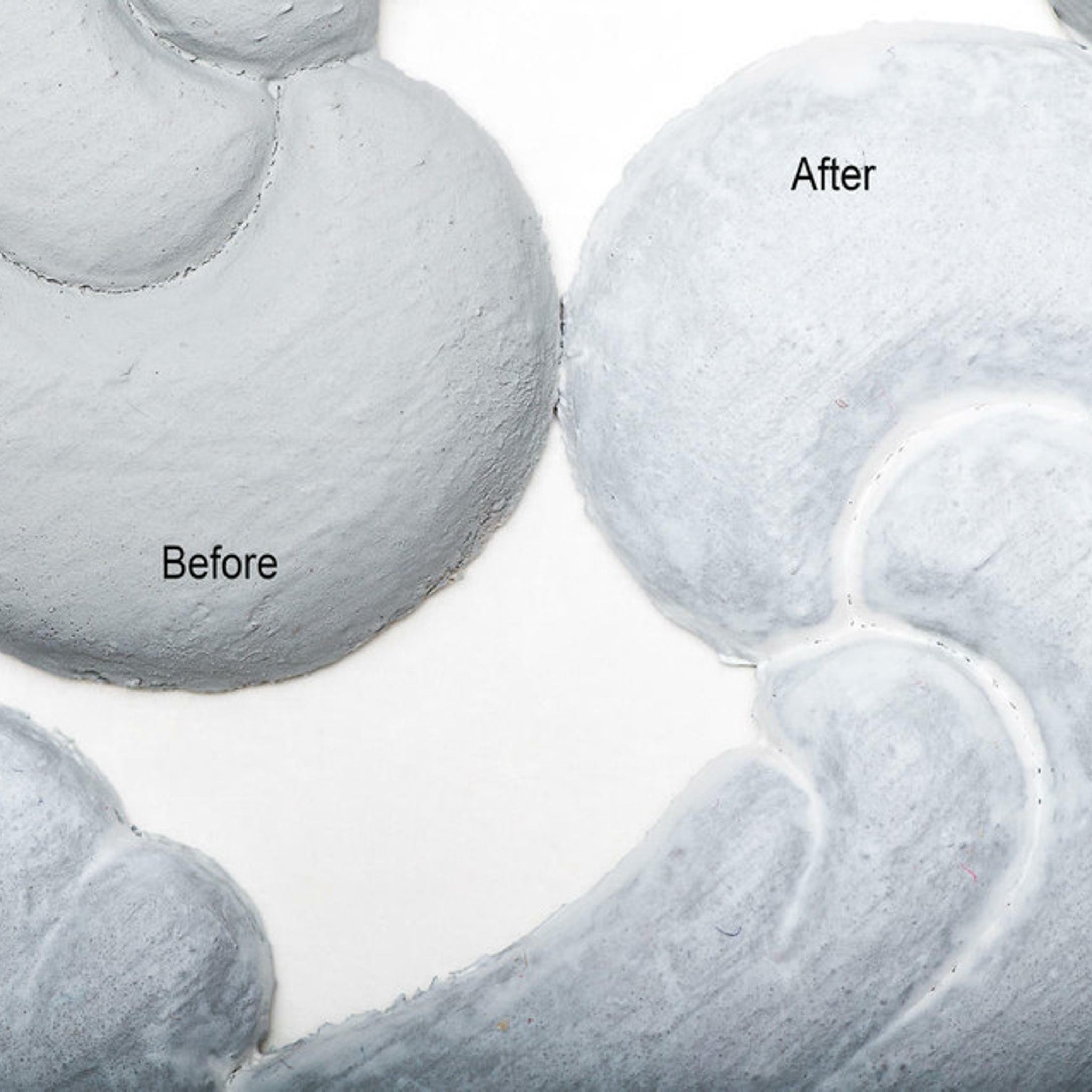 Close-up view of a light grey colored silicone mould casting that shows the before and after use of Dixie Belle's Whitewash Glaze.