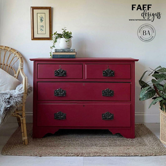 A vintage large 4-drawer dresser refurbished by Faff Designs features Dixie Belle's Fiery Sky Silk All-In-One Mineral Paint.