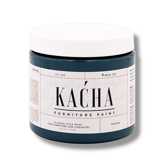 A 16 oz container of Kacha Furniture Paint in the color Danube (moody blue-green) is against a white background.
