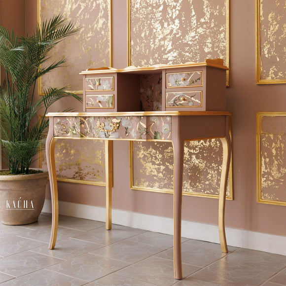 A vintage vanity desk refurbished by Kacha features Kacha Furniture Paint in the color Dusty Pink and has gold accents.