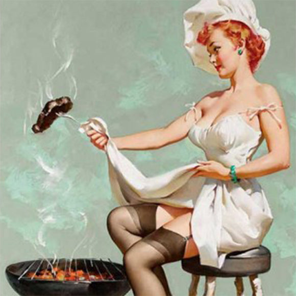 Close-up of a rice paper that features a fun design of a chef's hat-wearing lady in a white dress grilling on a stool.
