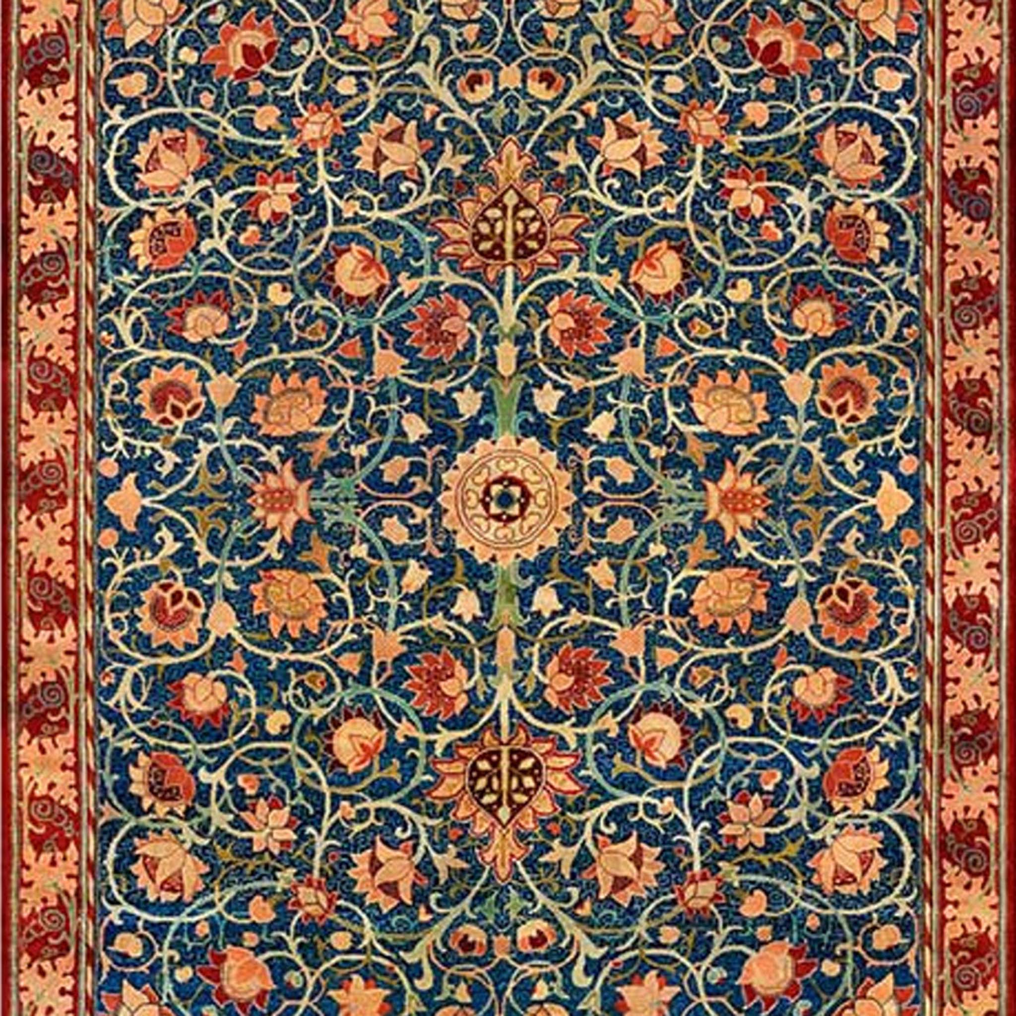 Close-up of an A0 rice paper design of a vintage carpet of reds and blues and features a repeating floral pattern.