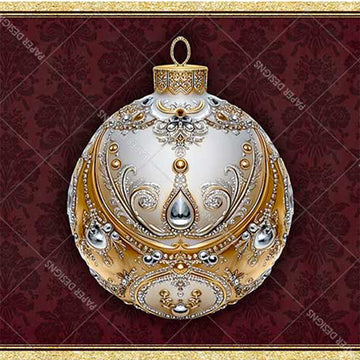 Decorative Christmas ornament with gold and white design on a red patterned background
