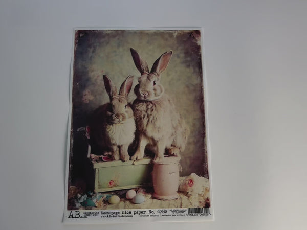 A 13 second video shows a close-up and hand lifting AB Studio's Bunny Family Vintage Style A4 rice paper against a white background.