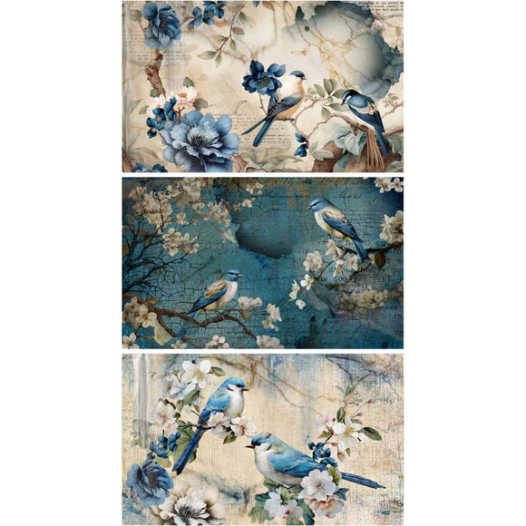 Three sheets of tissue paper against a white background each with a unique design: 2 with cream backgrounds and charming blue floral and bird motifs, and 1 with a striking blue background.