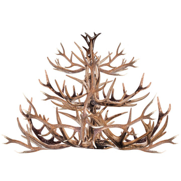 Rub-on transfer design against a white background of deer antlers fashioned into a chandelier.