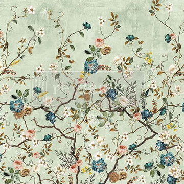 Close-up of an A1 fiber paper that features delicate climbing flowers in blue, white, and mustard hues against a soft green background.