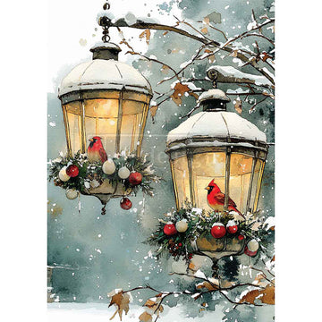 Two snow-covered lanterns with red birds and ornaments against a snowy background