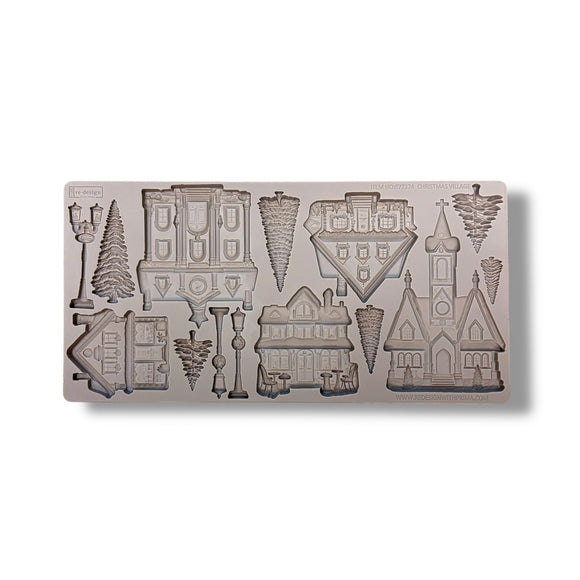 mold with various village shapes on a white background