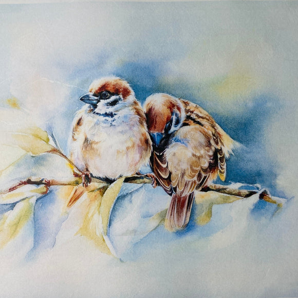 Close-up of an A4 rice paper design that features a beautiful watercolor image of two birds perched on a branch.