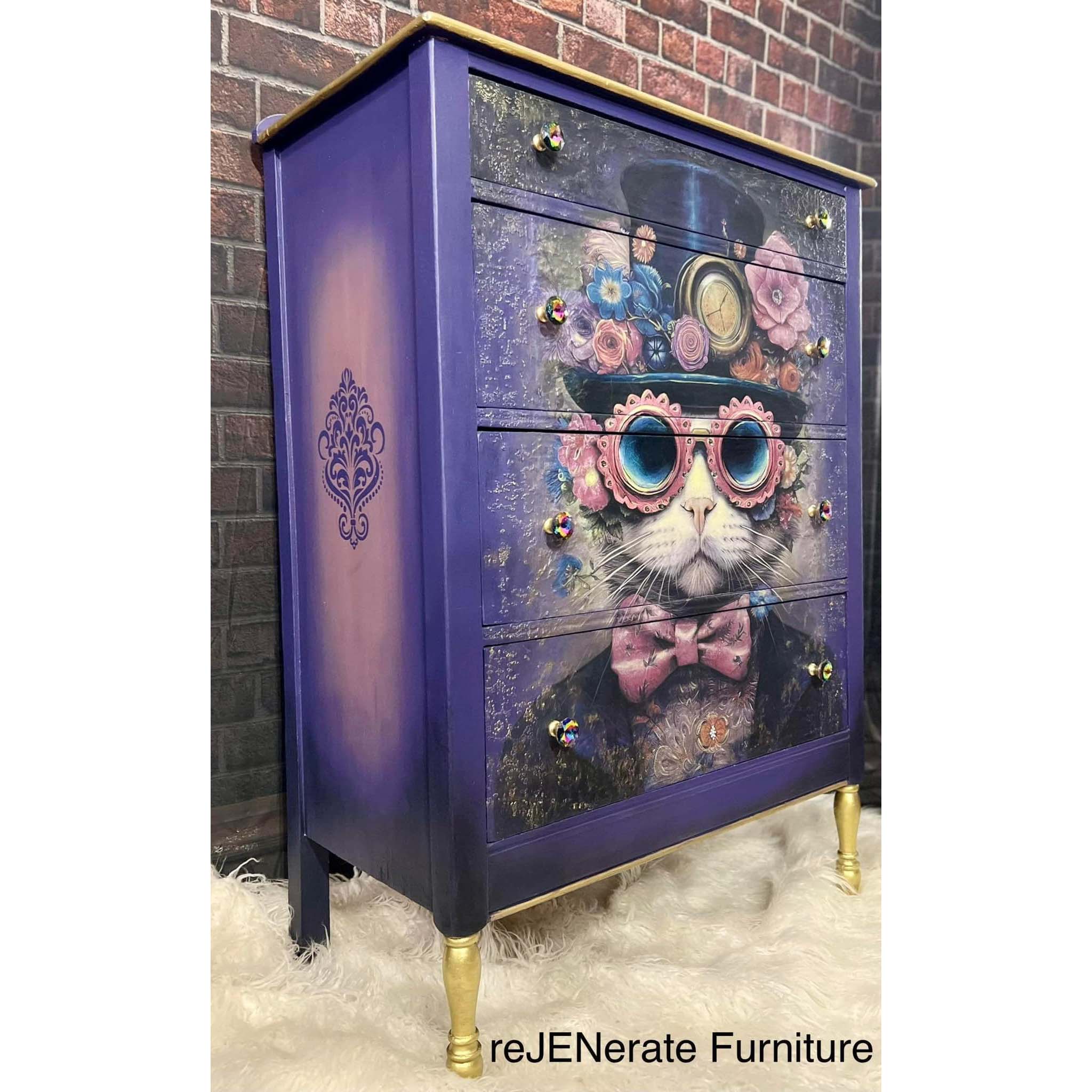 A vintage 4-drawer chest dresser refurbished by reJENerate Furniture is painted purple with a dark ombre blend at the bottom and features Whimsykel's Dapper Dan tissue paper covering the drawers. 