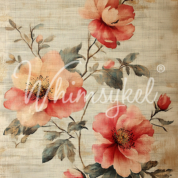 Close-up of a tissue paper featuring delicate pink and peach flowers on a beige linen background.