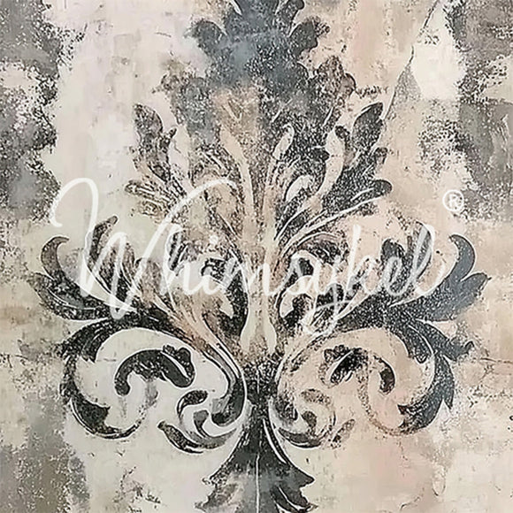 A close-up of a tissue paper featuring a charming charcoal damask flourish against a distressed cream background.