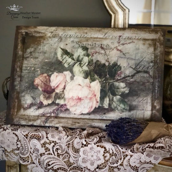 A wood project refurbished by Heather Meuter Design Team features the Sandrina rice paper in the center. The Decoupage Queen logo is also in the top left corner of the photo.
