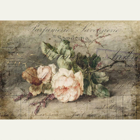 Rice paper design of vintage parchment with pink roses on a table. White borders are on the top and bottom.