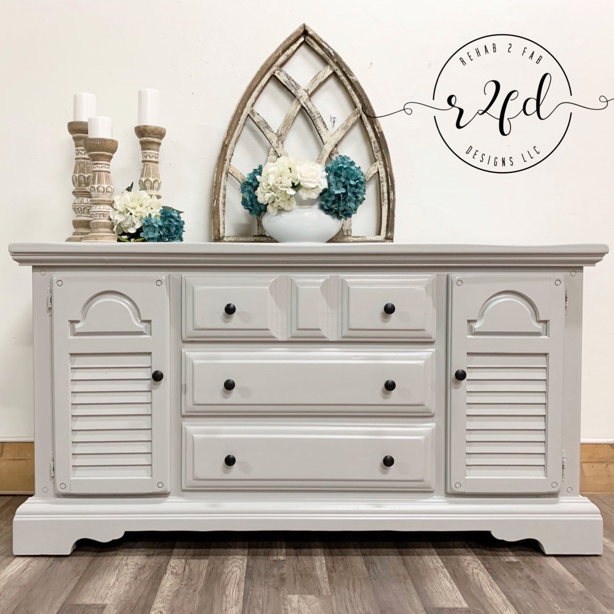 A large vintage dresser refurbished by Rehab 2 Fab Designs LLC is painted in Dixie Belle's Driftwood chalk mineral paint.