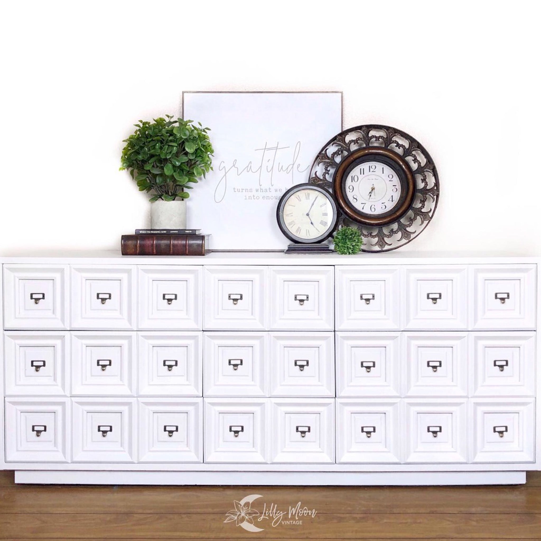 A large vintage dresser refurbished by Lilly Moon Vintage is painted in Dixie Belle's Fluff chalk mineral paint.