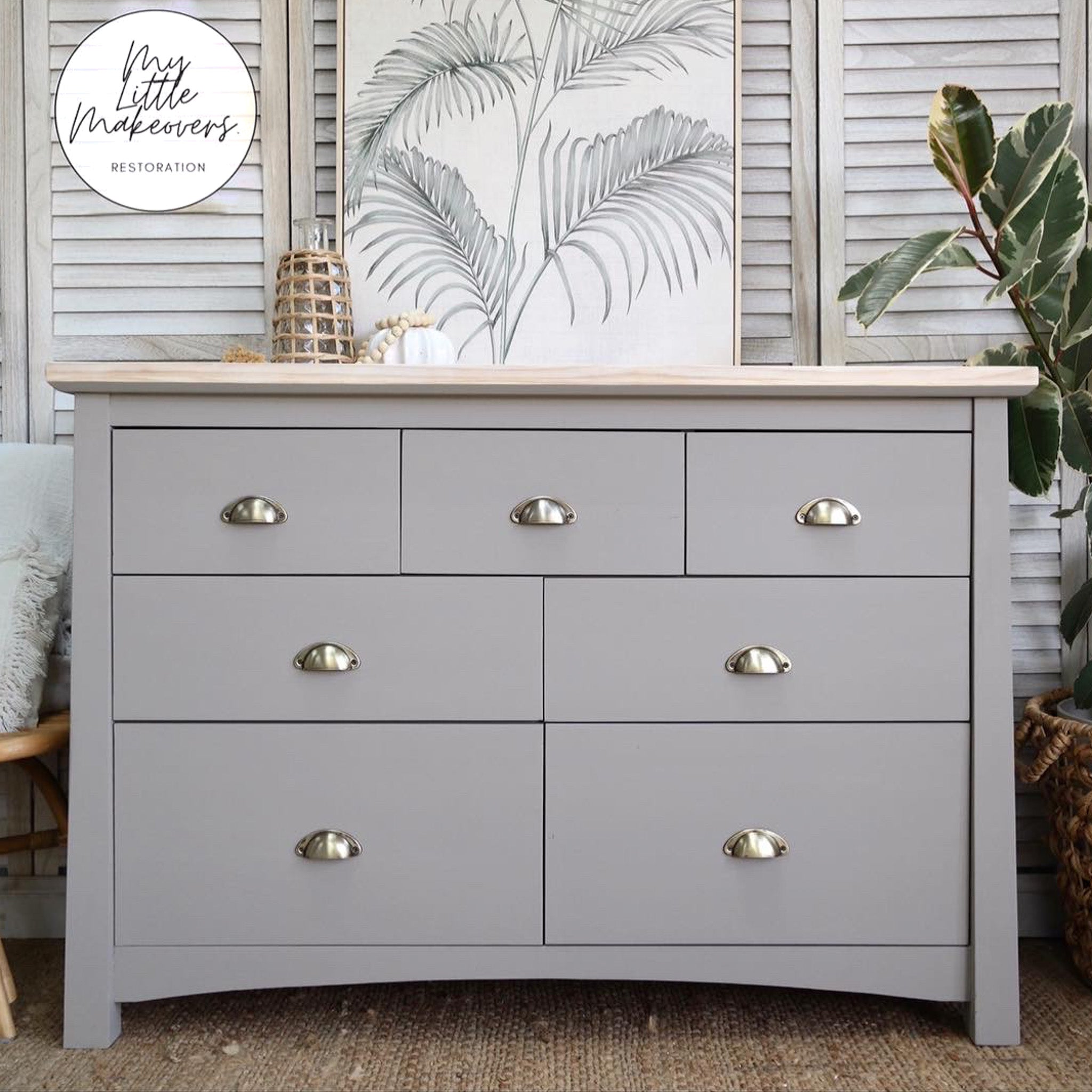 A 7-drawer dresser refurbished by My Little Makeovers Restoration is painted in Dixie Belle's French Linen chalk mineral paint.
