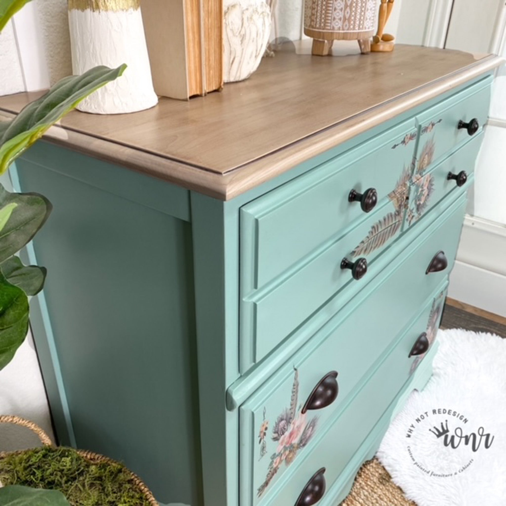 A vintage dresser refurbished by Why Not Redesign is painted in Dixie Belle's Sea Glass chalk mineral paint and has a natural wood top.