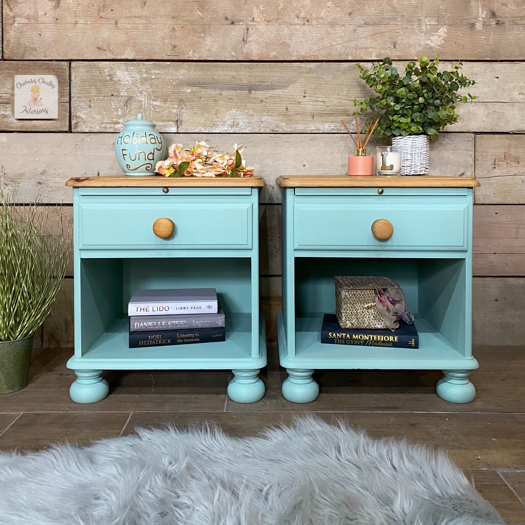 Two vintage nightstands refurbished by Cherubs Chalks Interiors are painted in Dixie Belle's Sea Glass chalk mineral paint and has natural wood tops.
