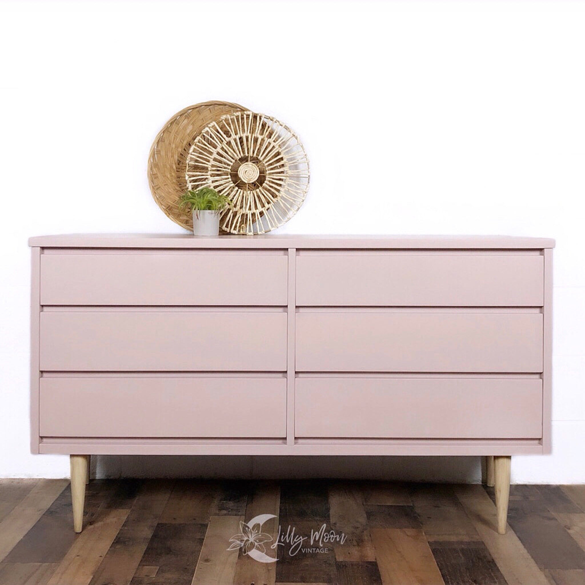 A mid-century 6-drawer dresser refurbished by Lilly Moon Vintage is painted in Dixie Belle's Tea Rose chalk mineral paint.