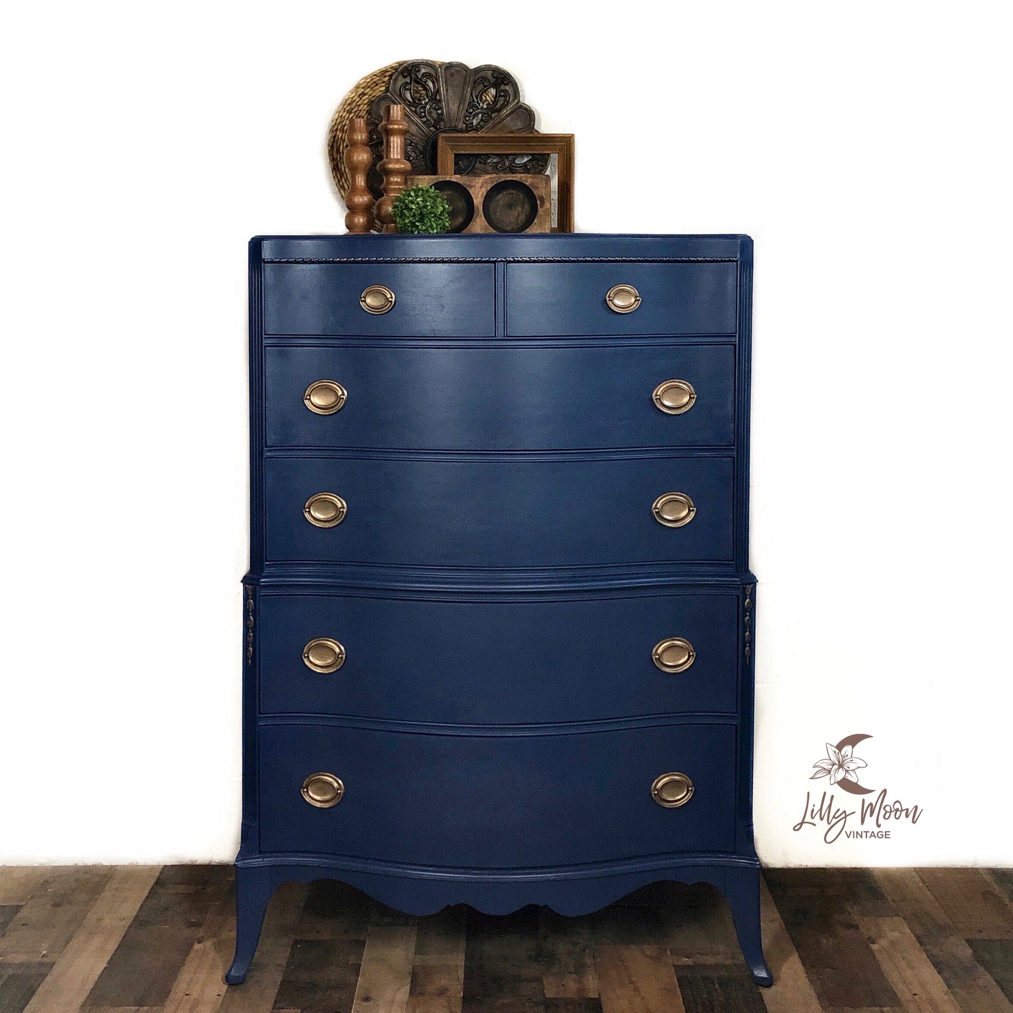 A vintage chest dresser refurbished by Lilly Moon Vintage features Dixie Belle's Bunker Hill Blue chalk mineral paint.