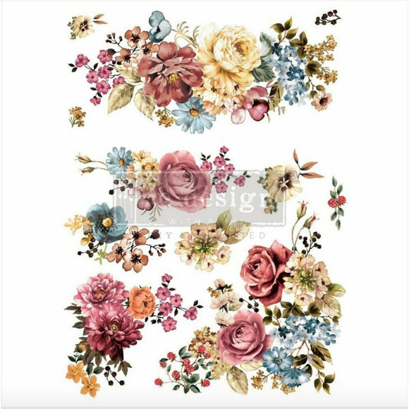 Rub-on transfer design of yellow, blue, and rose colored floral bouquets.