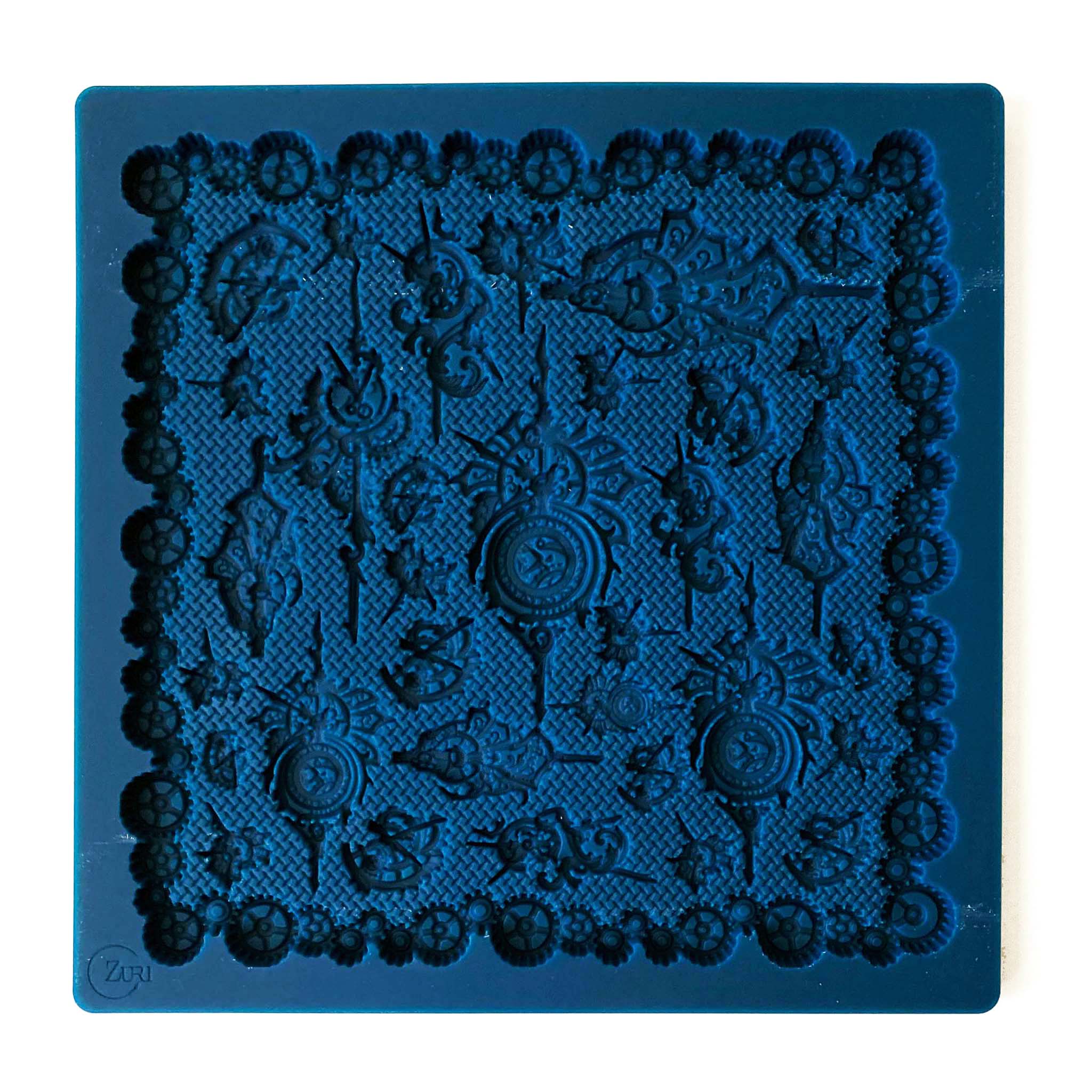 A blue silicone mold of Zuri's Steampunk Clocks is on a white background.