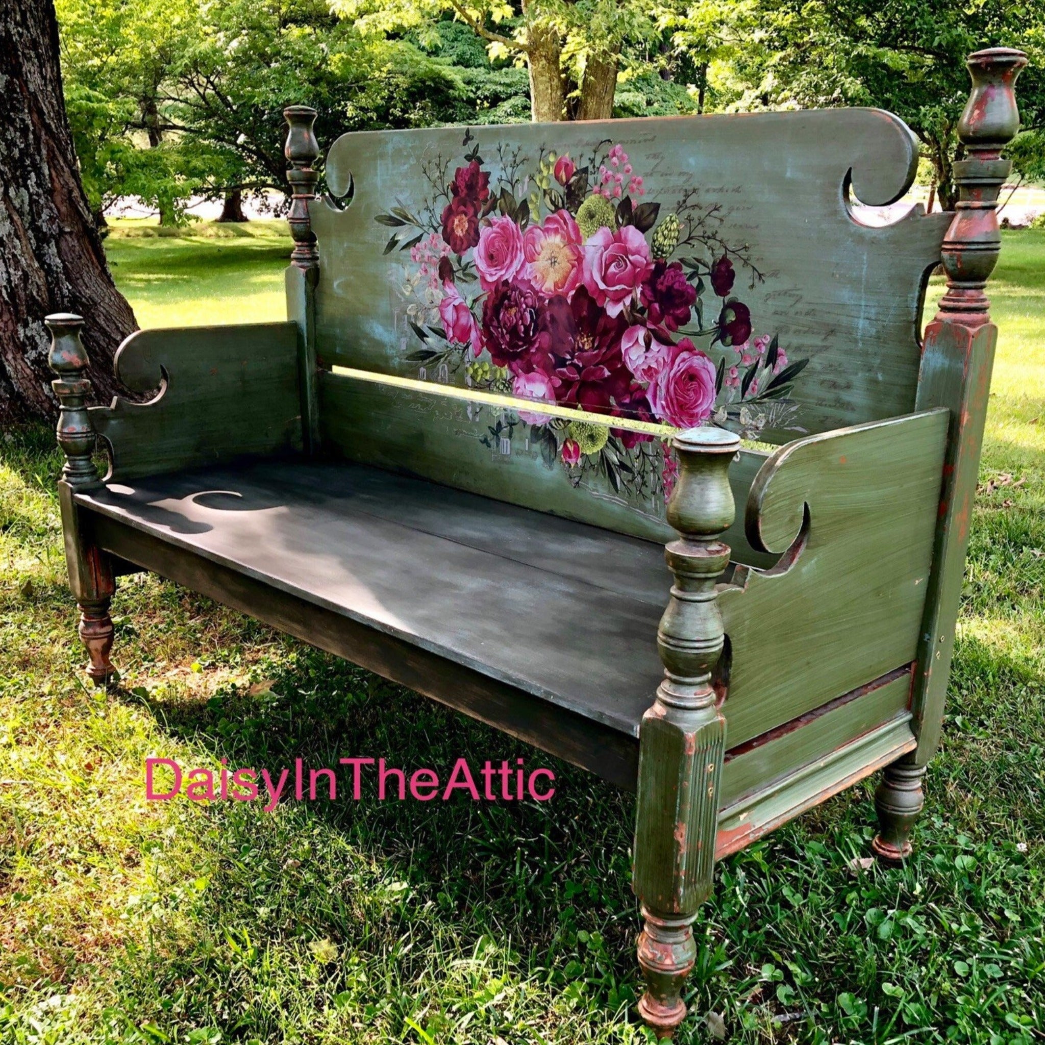 A vintage wood bench refurbished by Daisy In The Attic is painted a distressed olive green and features ReDesign with Prima's Royal Burgundy transfer on the seat back.