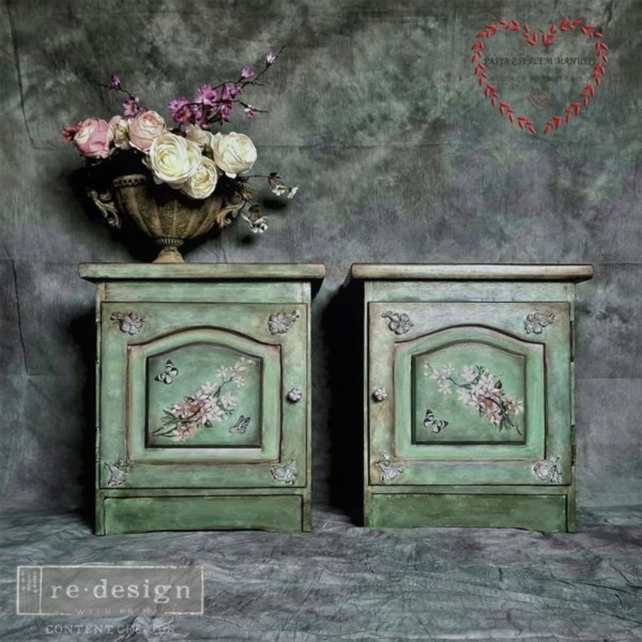 Two vintage nightstands refurbished by Pasja Z Sercem Manueli are painted a blend of light and dark greens and feature ReDesign with Prima's Blossom Botanica on its door inlays.