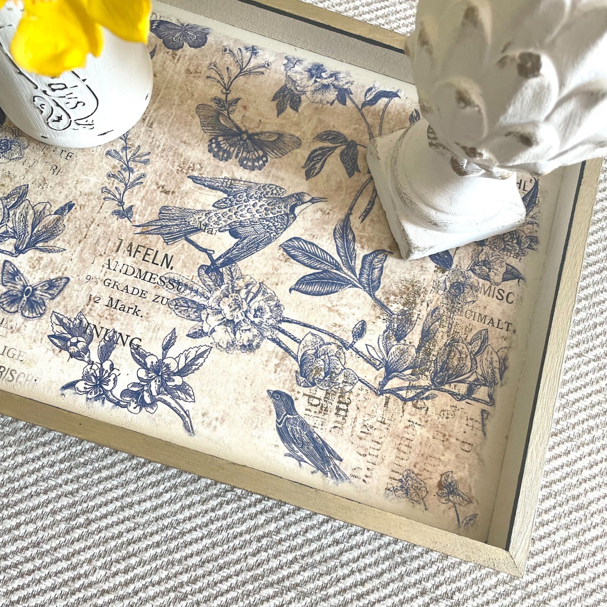 A wood tray features Decoupage Queen's Blue Flight rice paper on the inside.