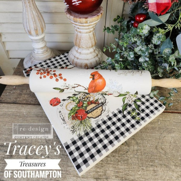 A cutting board and rolling pin refurbished by Tracey's Trasures of Southampton feature ReDesign with Prima's Winterberry small transfer on them.