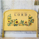 A vintage headboard refurbished by Click 2 Restore is painted bright yellow and features ReDesign with Prima's Sunflower transfer on it.