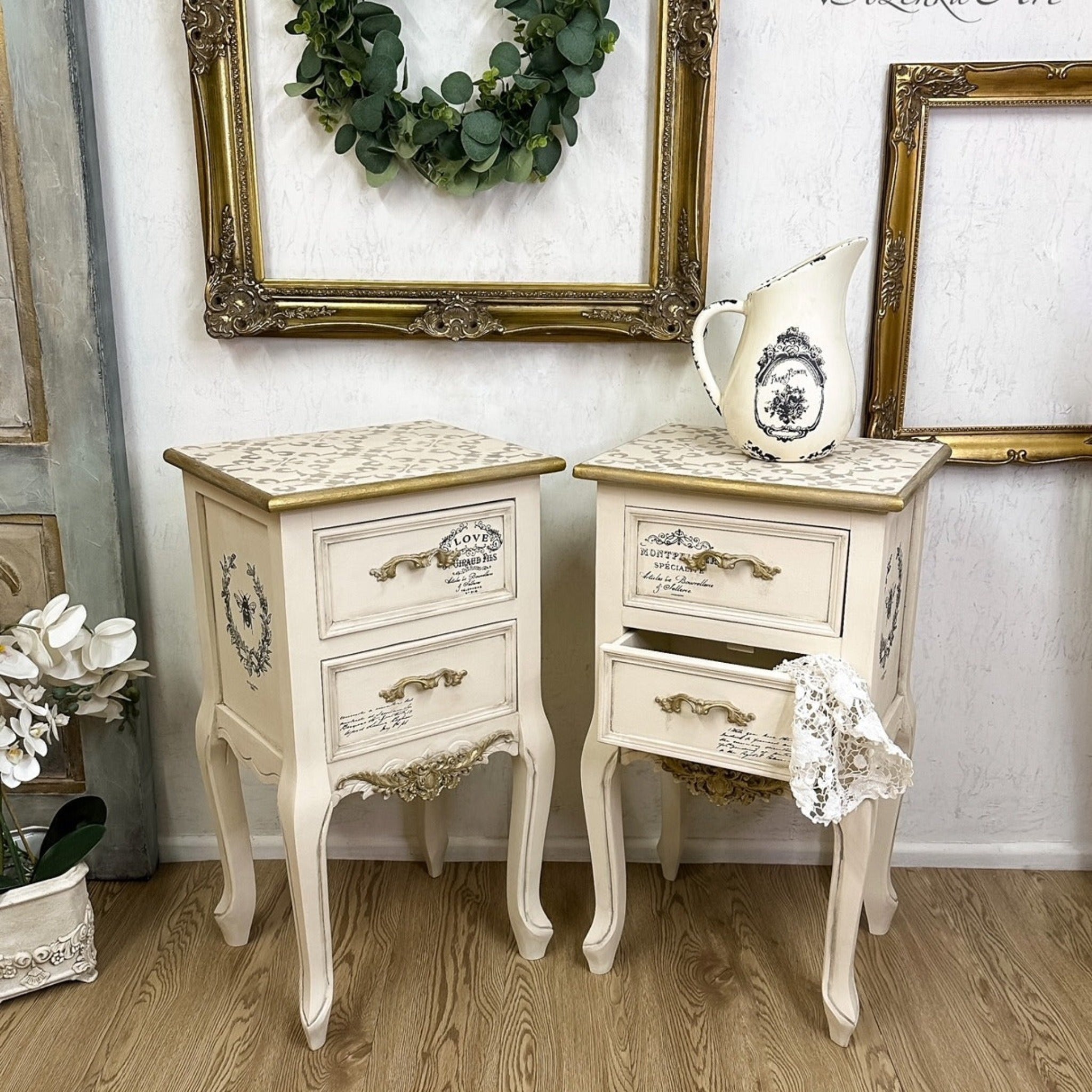 Two vintage nightstands and an antique water pitcher are painted antique white and feature ReDesign with Prima's French Labels small transfer on them.