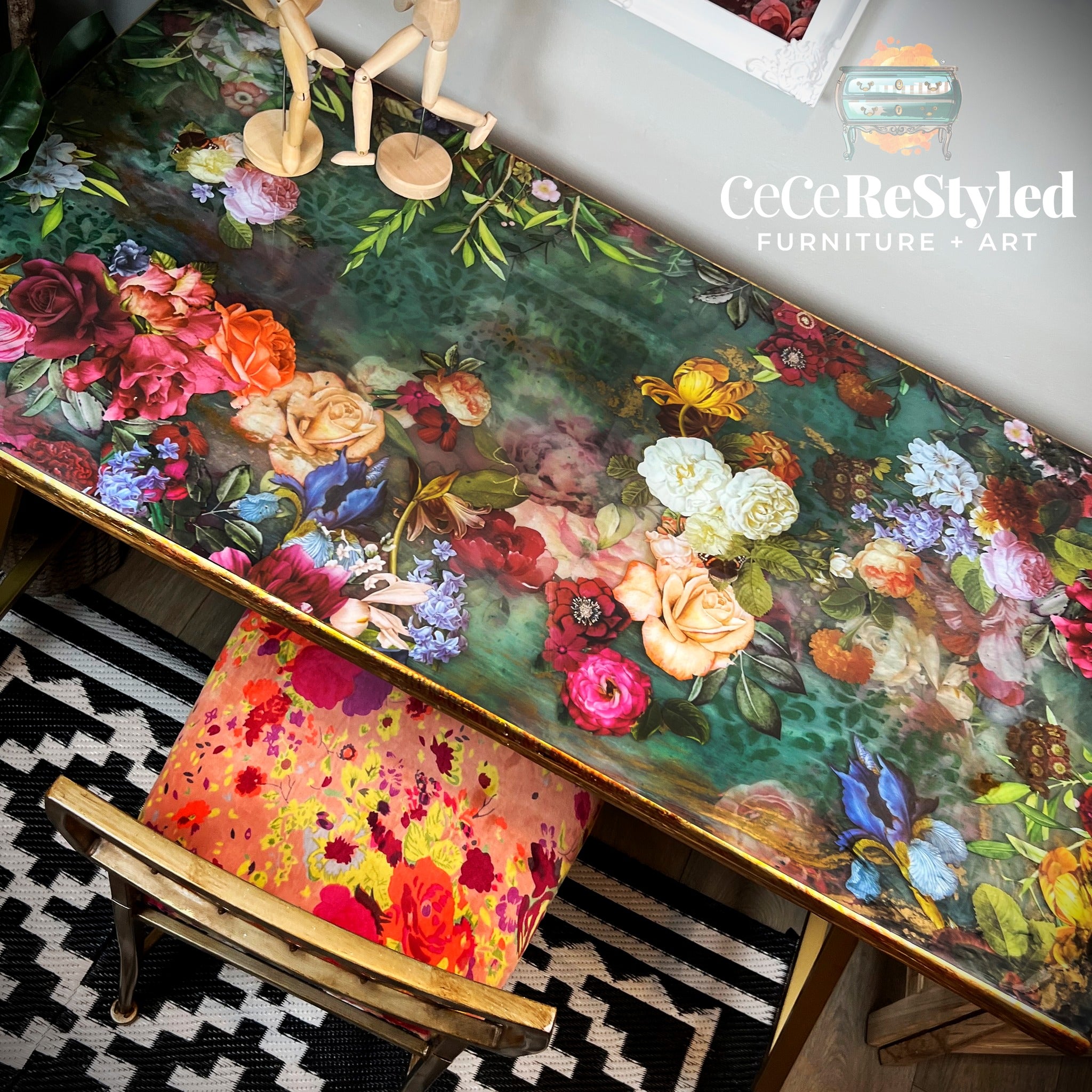 A desk refurbished by CeCe ReStyled features ReDesign with Prima's Blossomed Beauties small transfer on the desktop along with other floral transfers to create a beautiful flower garden against a dark green teal background.