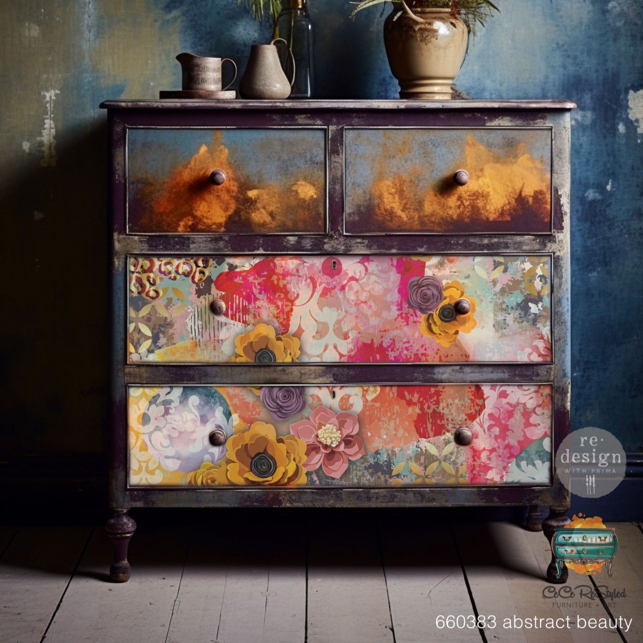 A vintage 4-drawer dresser refurbished by CeCe ReStyled is painted purple with blends of blue and rust orange and features ReDesign with Prima's Abstract Beauty tissue paper on the bottom 2 drawers.