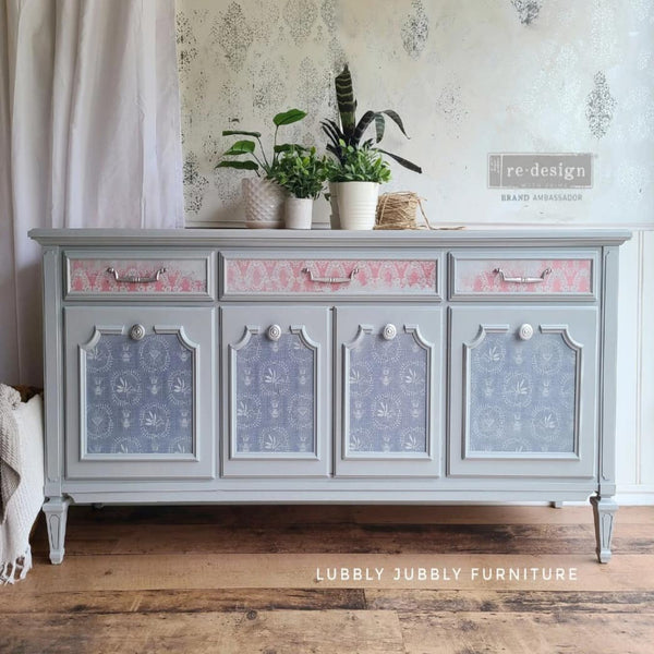 A vintage buffet table refurbished by Lubbly Jubbly Furniture is painted light grey and features 2 of the 3 ReDesign with Prima Delicate Charm tissue papers on its drawers and door inlays.