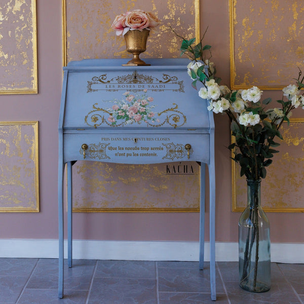 A vintage secretary's desk refurbished by Kacha is painted light blue and features ReDesign with Prima's Kacha Les Roses transfer on it.