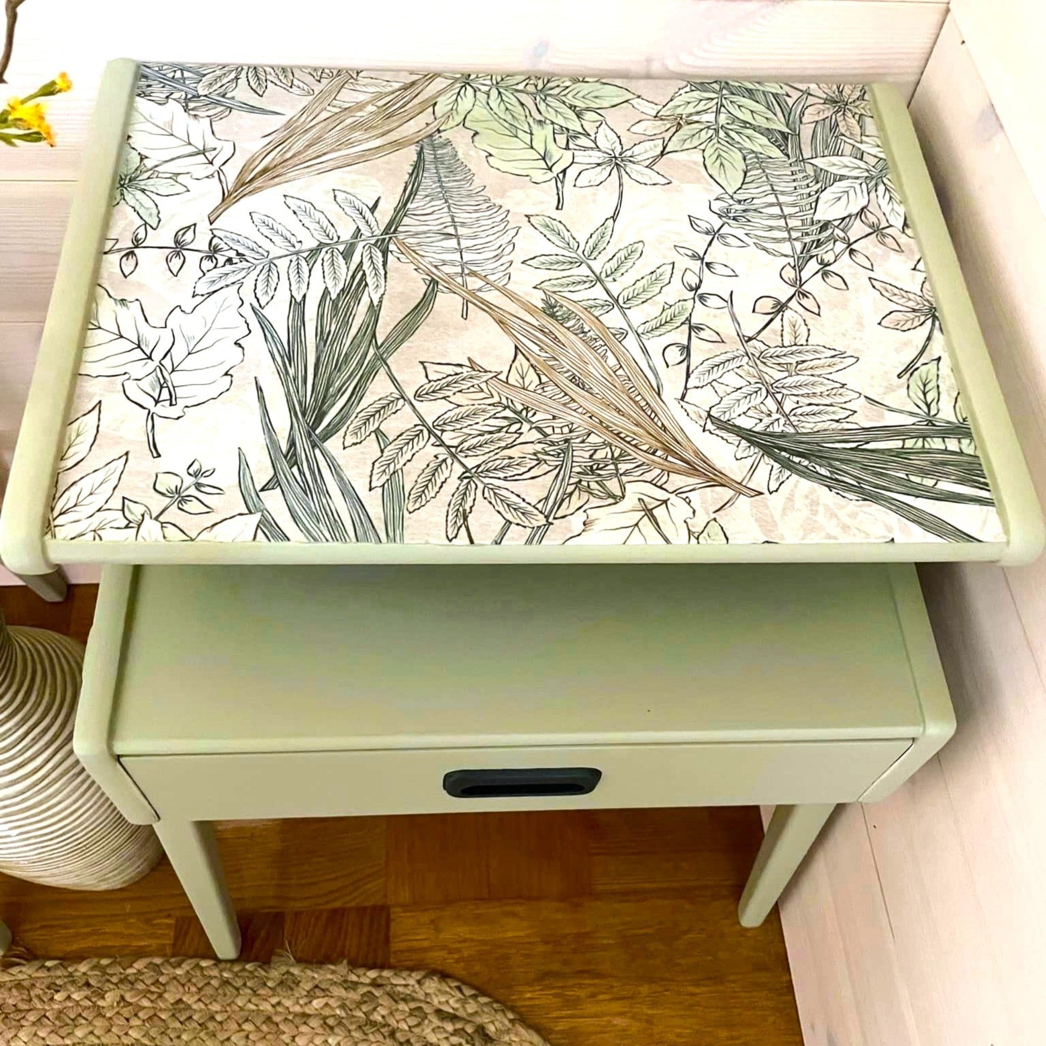 A vintage side table refurbished by Izmayanie Yahaya is painted Spring green and features ReDesign with Prima's Tranquil Autumn tissue paper on its top shelf.