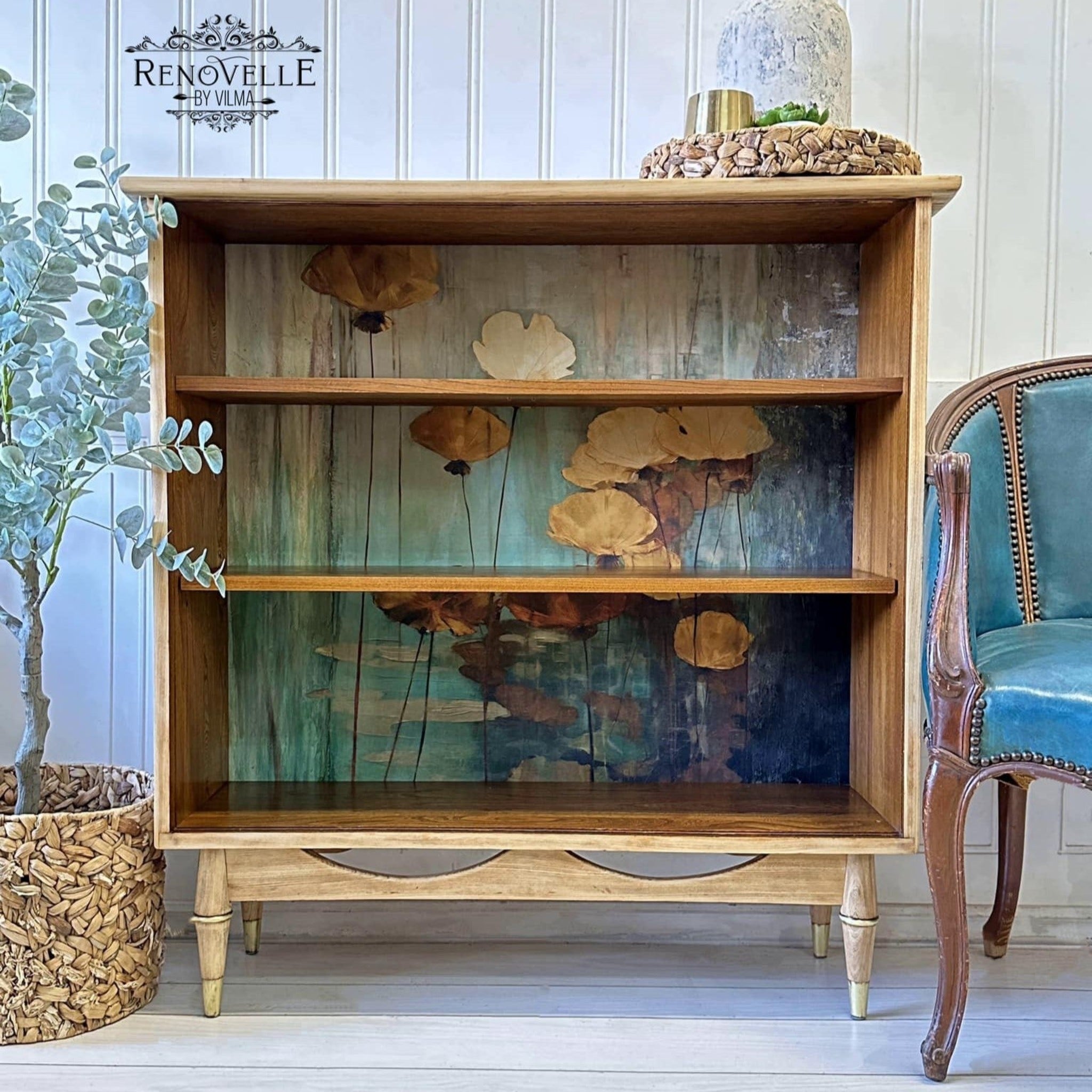 A small open shelved console table refurbished by Renovelle by Vilma is stained natural wood and features ReDesign with Prima's Eternal Lotus A1 fiber paper on its backboard.